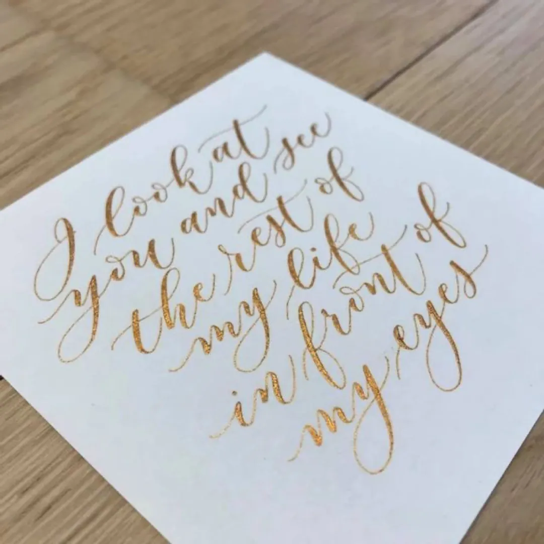 Student work: “I look at you and see the rest of my life…” in gold ink