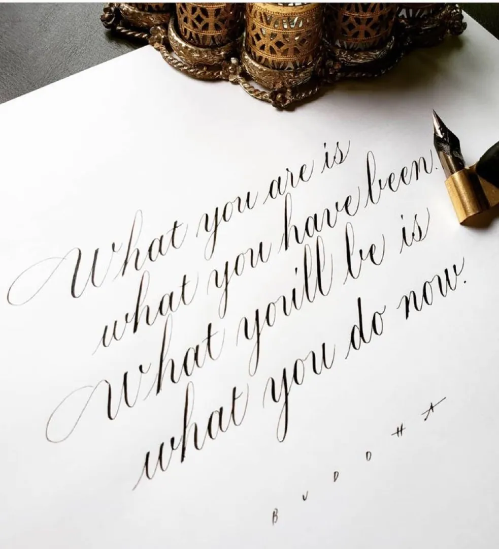 Student work: quote “What you are is what you have been…” in pointed-pen script