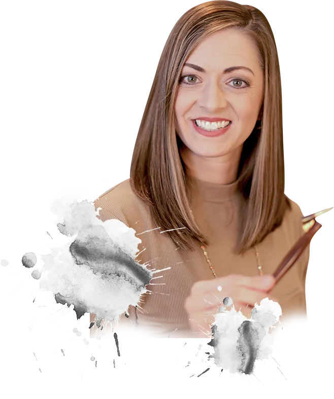 Heather McKelvey holding a pointed pen